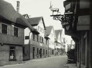 Besigheim. Kirchstraße : Besigheim. Straßenblick Kirchstraße mit Ausleger Gasthaus Hirsch und Metzger Wilhelm Sieber (1931)