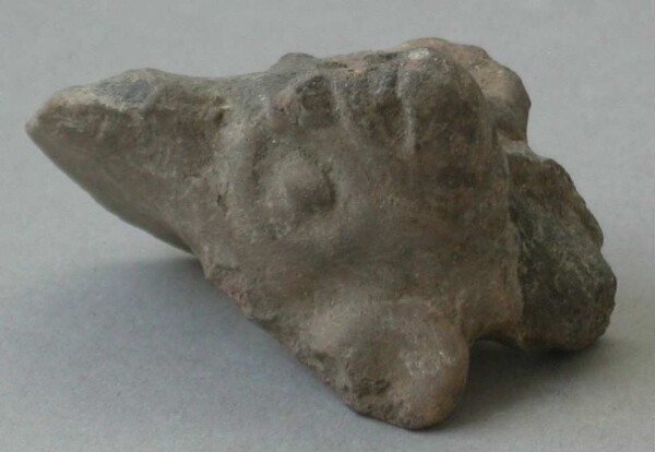 Fragment of a clay rattle (clay head)