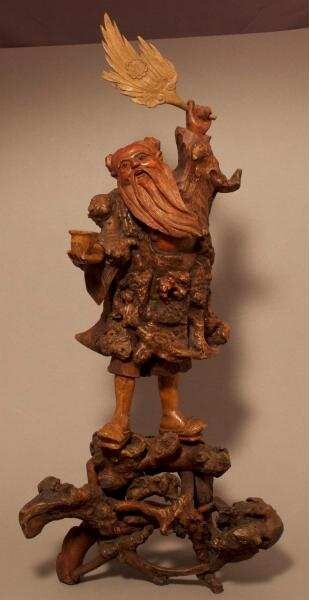Figure of a man with a fan: depiction of the ...