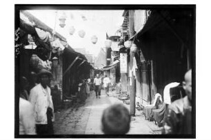 Straßenansicht in Phetchaburi : Phetchaburi. Ansicht einer schmalen Straße in der Stadt, 1909