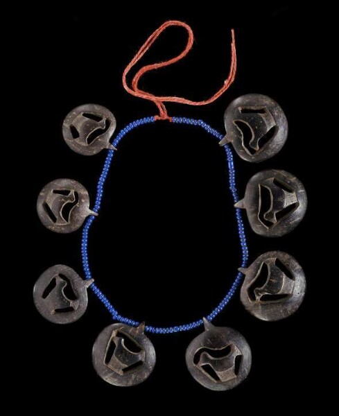 Necklace made from glass beads and tukum nut shells