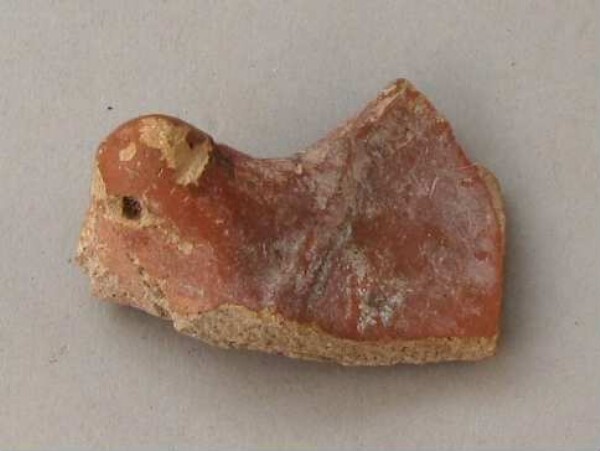 Fragment of a clay vessel