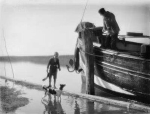 Fischer an der Elbe mit Kind und Hund