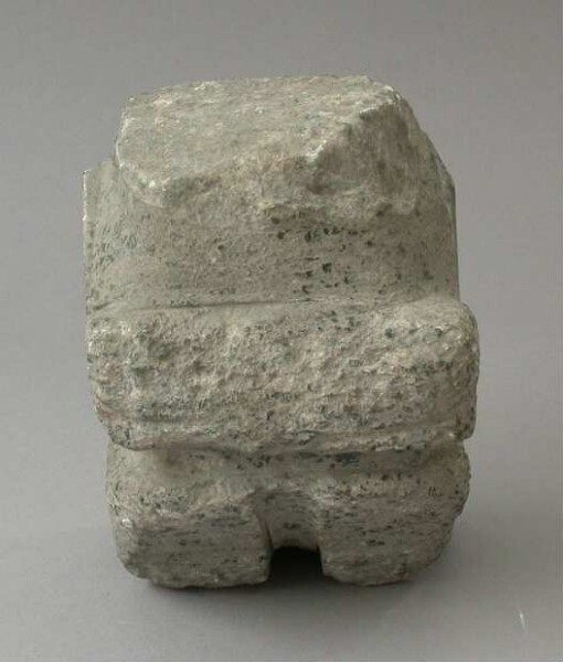 Lower part of a stone figure