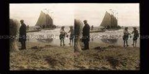 Segelboote und Badegäste am Strand, Norderney