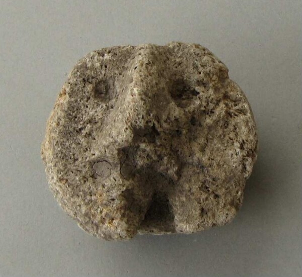 Stone head (fragment)