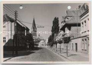 Neheim-Hüsten, Möhnestraße und Pfarrkirche St. Johannes Baptist in Neheim