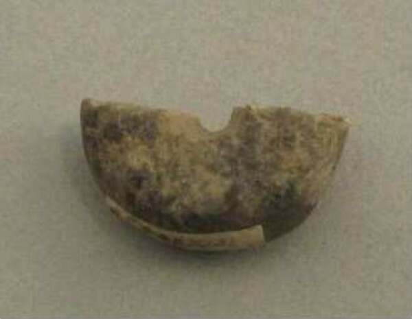 Stone bead (fragment)