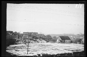 Grodno (=Hrodna, Weißrussland): Blick über einfache Holzhäuser auf die Stadt