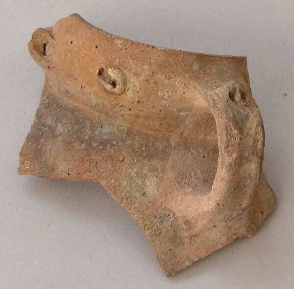 Fragment of a clay vessel