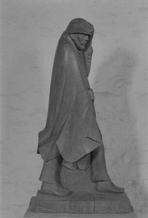 Wanderer im Wind : Wanderer im Wind. Eichenholz; H. 120 cm (1934; E. Barlach). Güstrow: Gertrudenkapelle