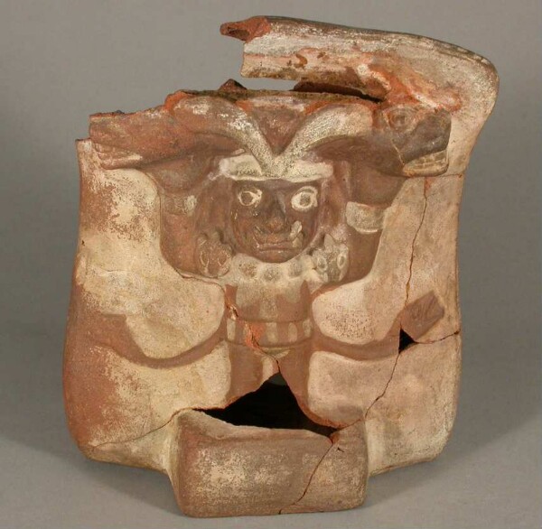 Relief: anthropo-zoomorphic figure under the double-headed serpent