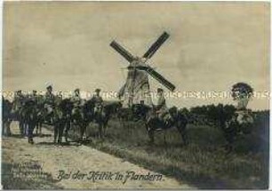 Kavallerieoffiziere vor Windmühle in Flandern