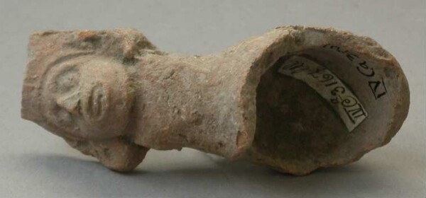 Fragment of a clay rattle (clay head)