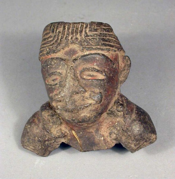 Fragment of a clay vessel