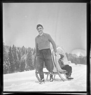 Handwerker mit Trog und Schlitten