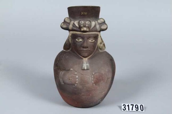 Vessel in the shape of a person