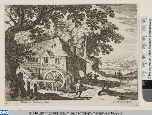 Mühle mit großem Wasserrad am Waldrand