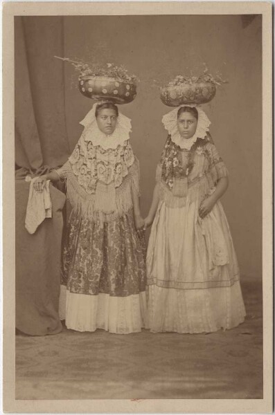 Two Zapotec women in festive costume