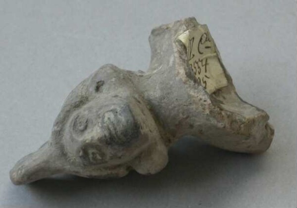 Fragment of a clay rattle (clay head)