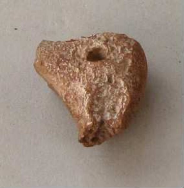 Fragment of a clay vessel