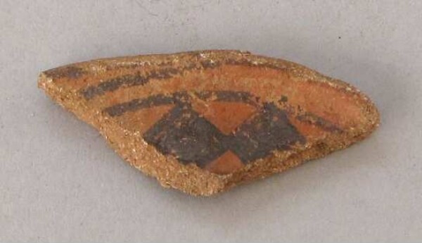 Fragment of a clay vessel