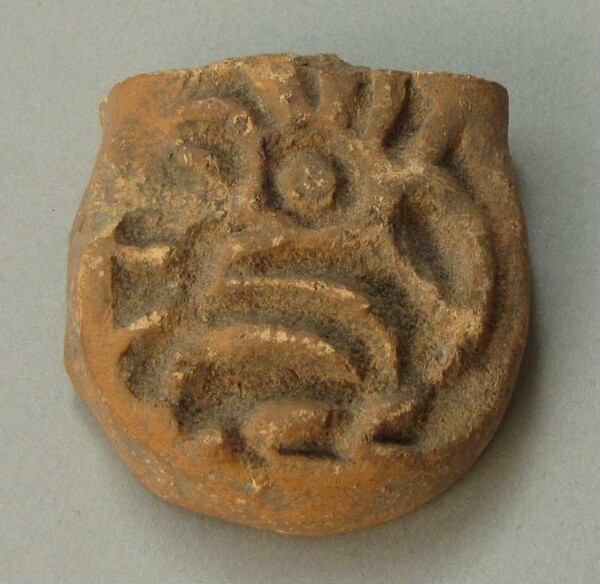 Handle of a clay vessel (fragment)