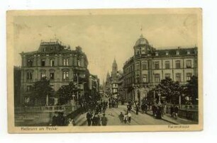 Blick von der Neckarbrücke in die untere Kaiserstraße mit Hauptpost, im Hintergrund der Kiliansturm