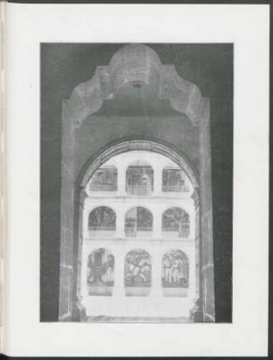 [Photograph of the inner courtyard of the school with frescoes]
