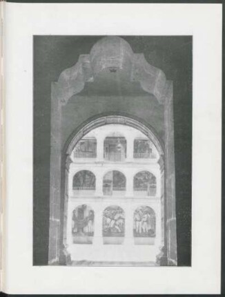 [Photograph of the inner courtyard of the school with frescoes]