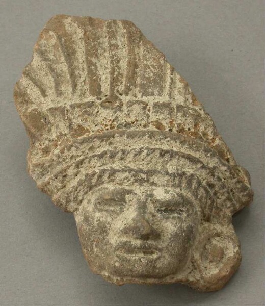 Clay head (fragment)