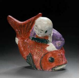 Junge mit Tai-Fisch