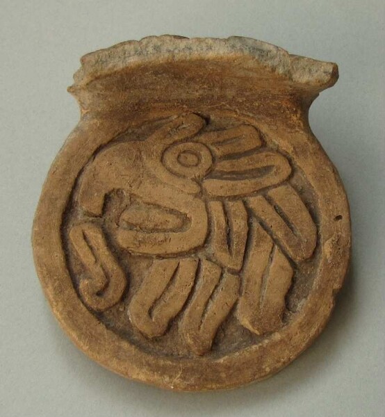 Handle of a clay vessel (fragment)