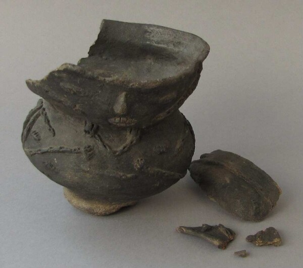 Fragments of a clay vessel