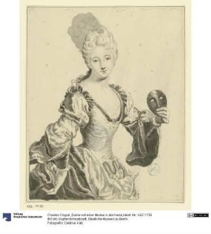 Dame mit einer Maske in der Hand