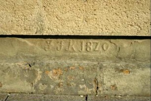 Inschriftstein in einem Haus JFR 1820