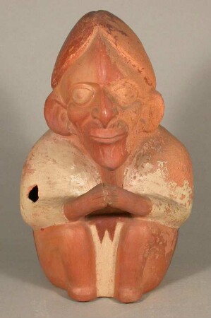 Sitzende anthropomorphe Figur in Penisgestalt