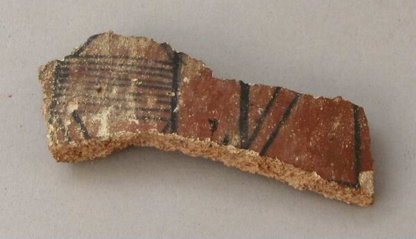 Fragment of a clay vessel