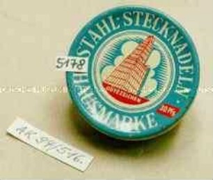 Blechdose für "STAHL-STECKNADELN HAUSMARKE 30 Pfg. GÜTEZEICHEN" (Abbildung eines Wolkenkratzers)
