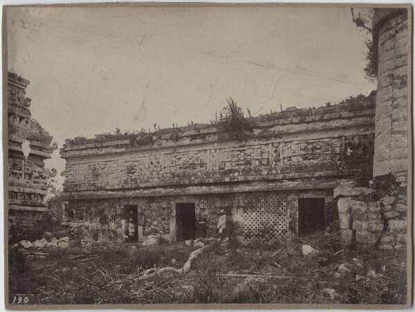 "Nun's house. East wing, seen from the north. Iglesia on the left. (With members of the expedition.)"