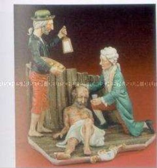 Figurengruppe mit Arzt und Patient