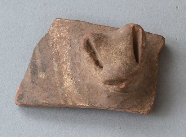 Clay animal head (vessel fragment)