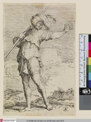 [A standing warrior holding a staff over his shoulder and gesturing with an outstretched arm; Ein stehender Krieger, der einen Stab über seiner Schulter trägt und mit dem ausgestreckten Arm gestikuliert]