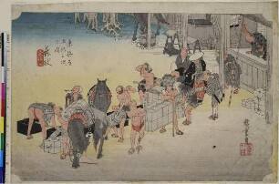 Fujieda: Beim Wechsel von Trägern und Pferden, Blatt 23 aus der Serie: Die 53 Stationen des Tōkaidō, Hoeidō Edition