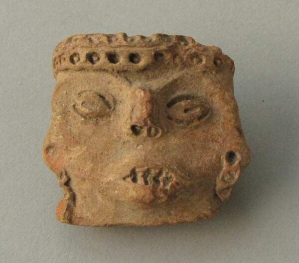 Clay head (fragment)