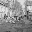 Große Straße / B 75: Ausbau: Verlegung der Regenwassersiele: Straßensperrung, Bagger, Arbeiter an Rohrgraben: rechts Einmündung der Straße Lohe: Eckhaus rechts Ratskeller: links Geschäft "Quick Kleiderpflege", daneben Gebäude Stadtverwaltung "Stadtbauamt Stadtkasse": Fußgänger: hinten Freiflächen mit Alleebäumen
