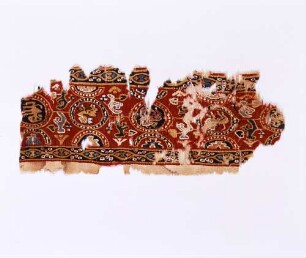 Fragment eines Streifens mit Tiermedaillons