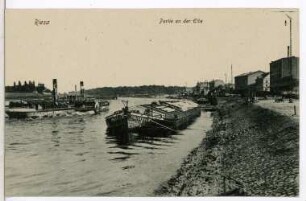 Riesa. Elbe mit Schlepper und Lastzillen
