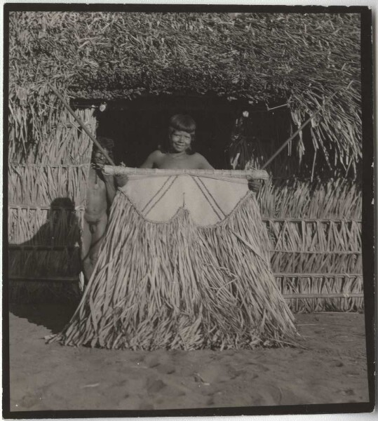 Festive girls of the Kokrit Society with their dance mask (Canela)