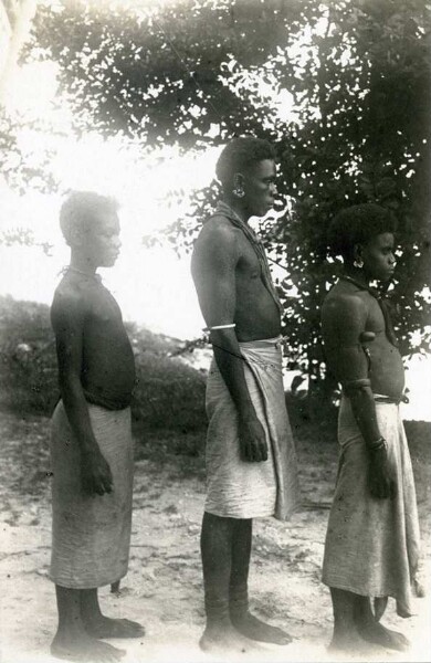 "Three Malaita boys with long skirts"